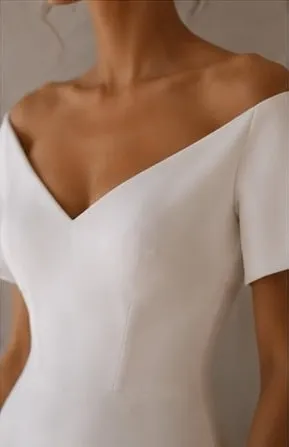 Close detail of the matte crepe on the Amalia wedding gown