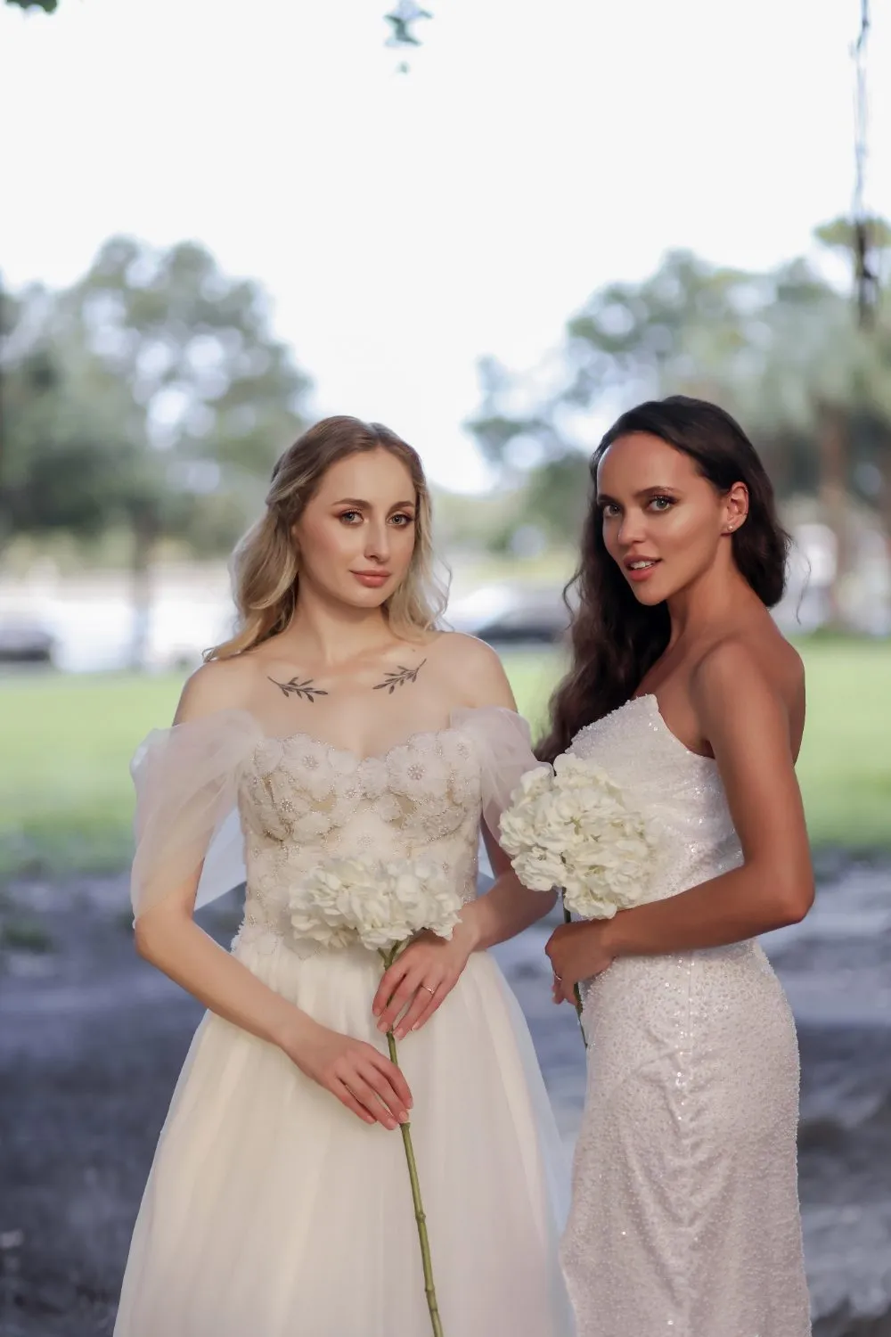 Two made-to-measure gowns photographed together: a sequinned column and an ivory tulle A-line