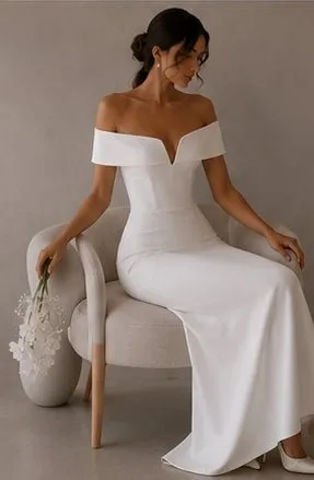 Emmeline wedding gown worn seated, showing how the skirt falls