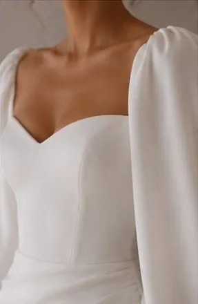 Close detail of the wedding satin on the Fiorella wedding gown