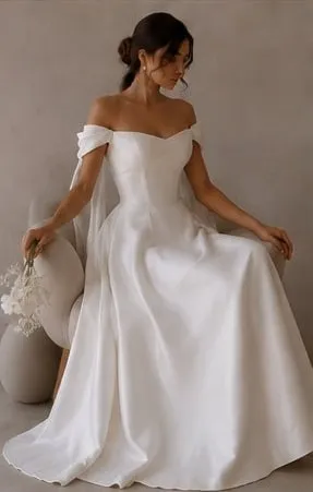 Honorine wedding gown worn seated, showing how the skirt falls