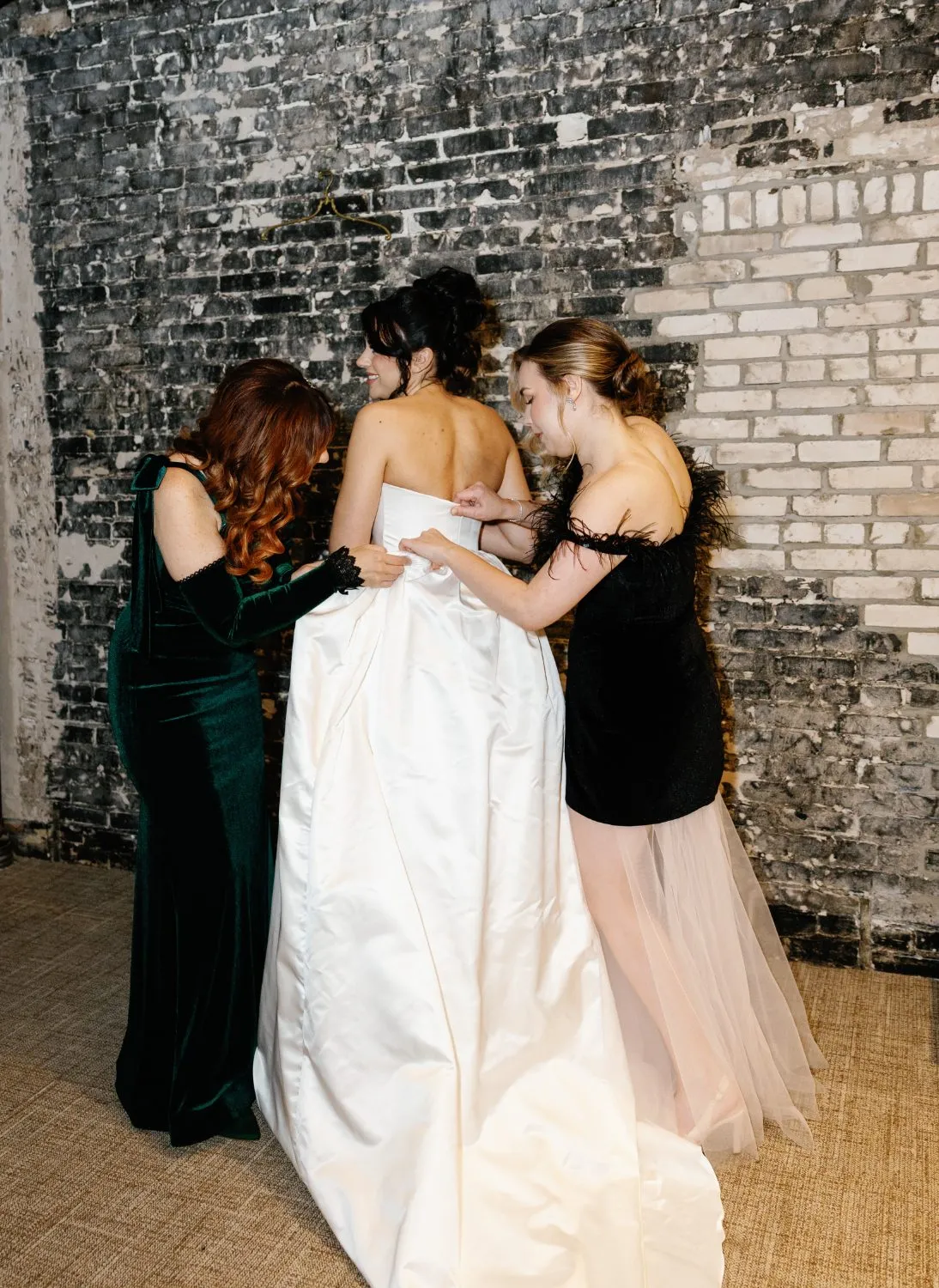 The bride being dressed, twenty minutes before the ceremony