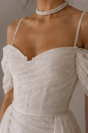 Close detail of the silk mikado with overlay on the Theodora wedding gown